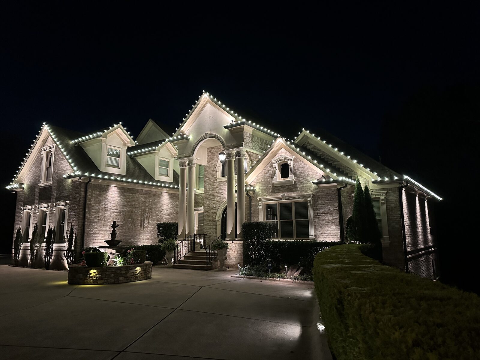 Roofline lights running along a steep gable