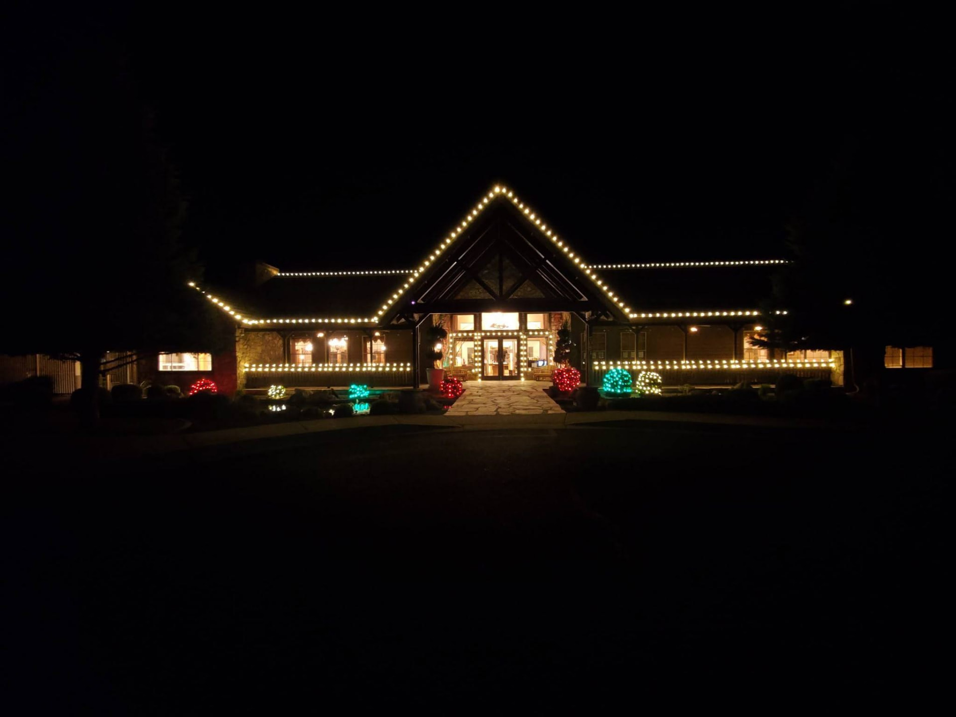 Long roofline outlined in bright white lights
